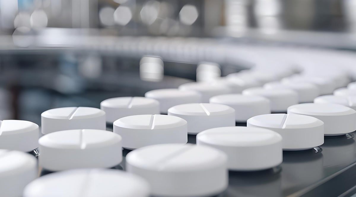 Tablets on the rotary feeder of a tablet production line