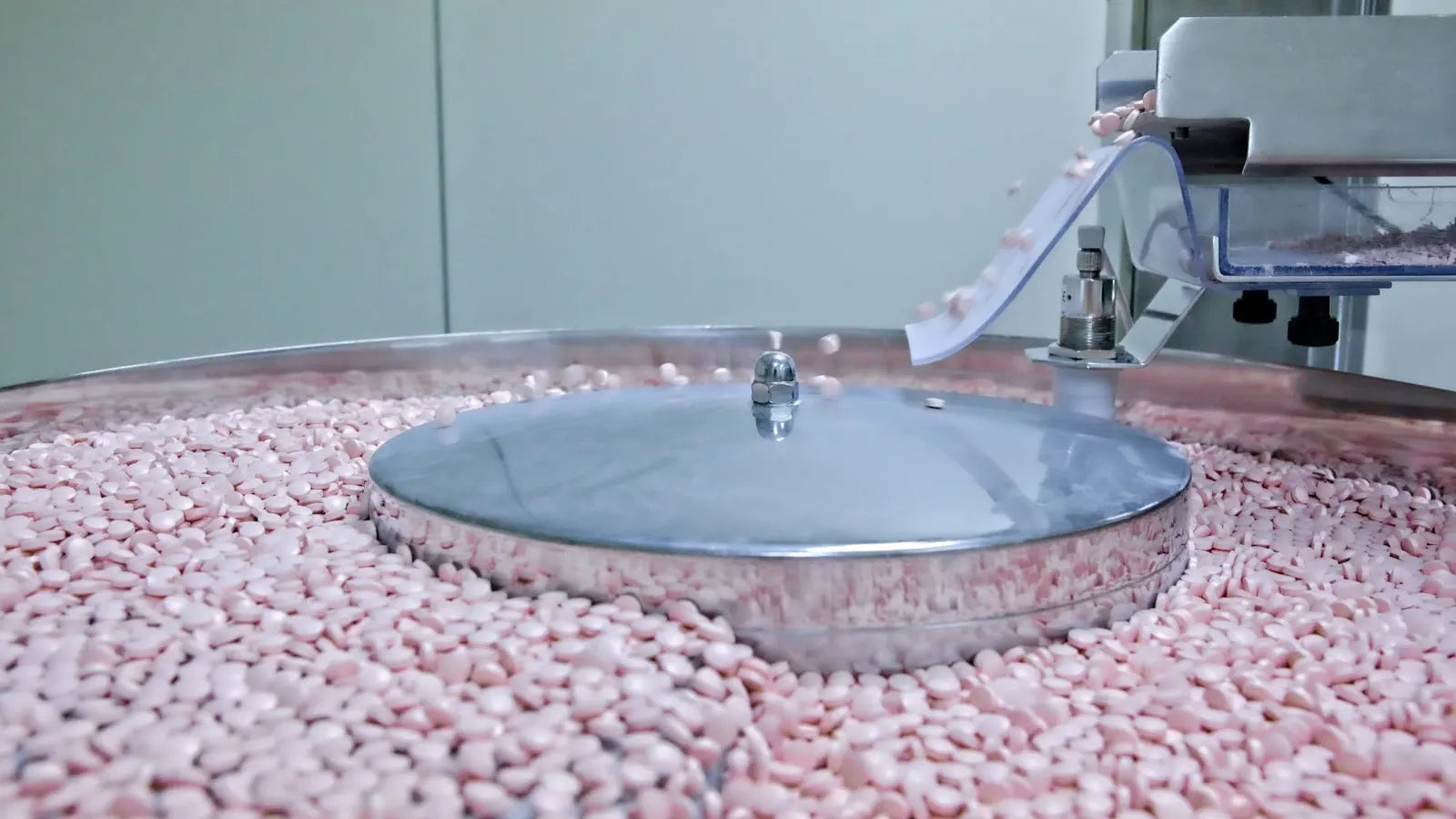 Tablets on the rotary feeder of a tablet production line